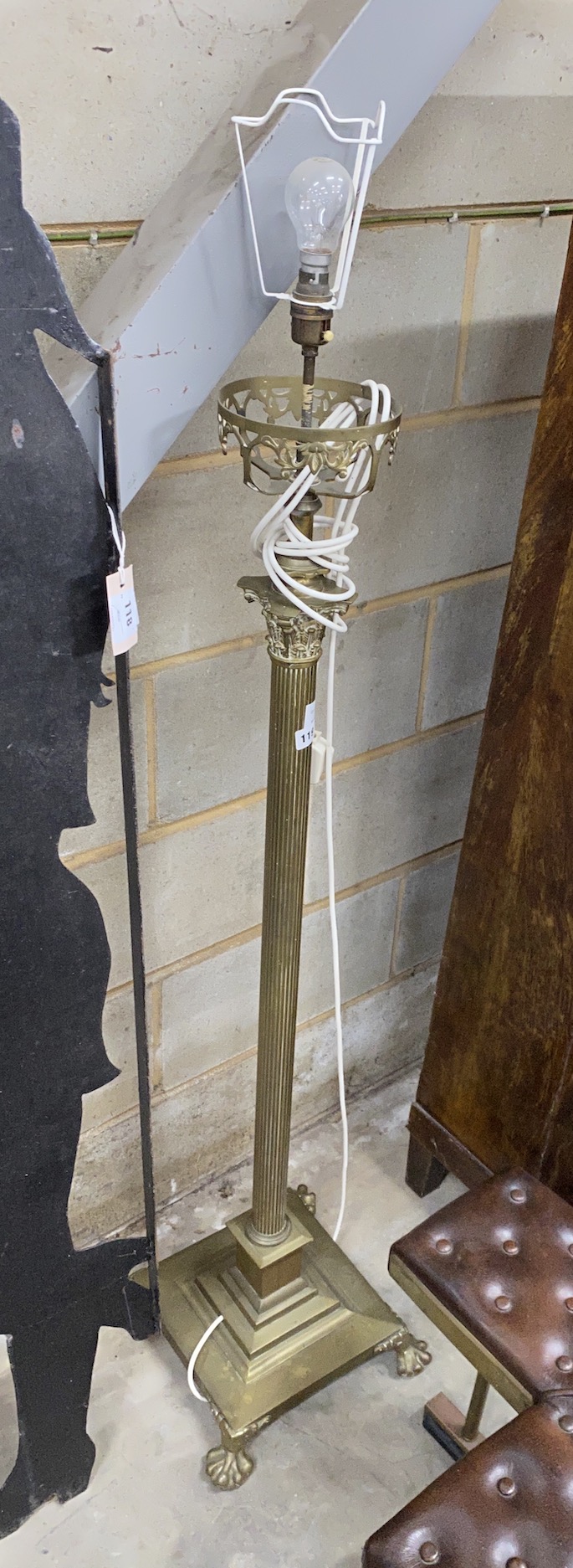 An Edwardian brass Corinthian column telescopic oil standard lamp converted to electricity